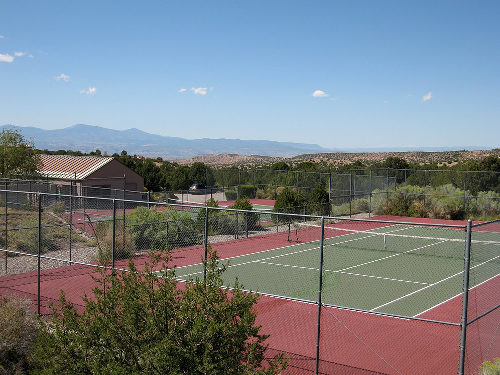 Tennis courts at Los Caminitos, one of the many community amenities